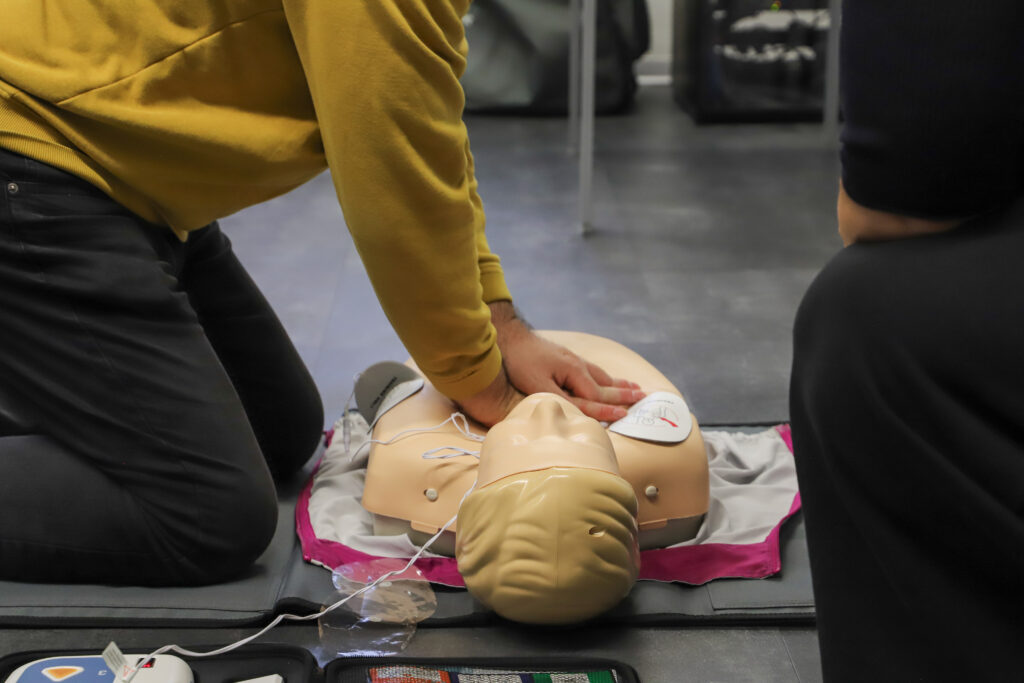 Cardiac Arrest recognition and CPR practice using an adult manikin during hands on emergency response training